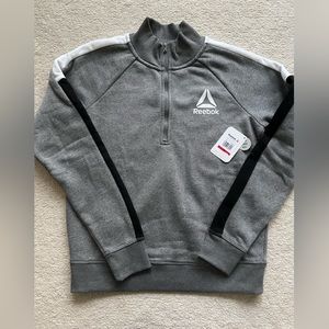 Reebok Women’s half zip sweater size small. NWT.